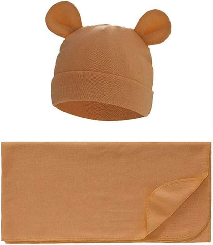 Brown baby hat with ears and matching blanket on a white background