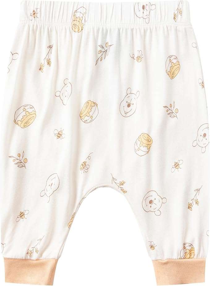 Baby pants with gold embroidery on a white background