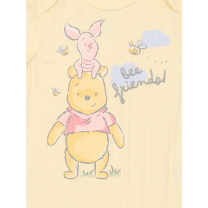 Baby romper with cartoon characters on a light yellow background