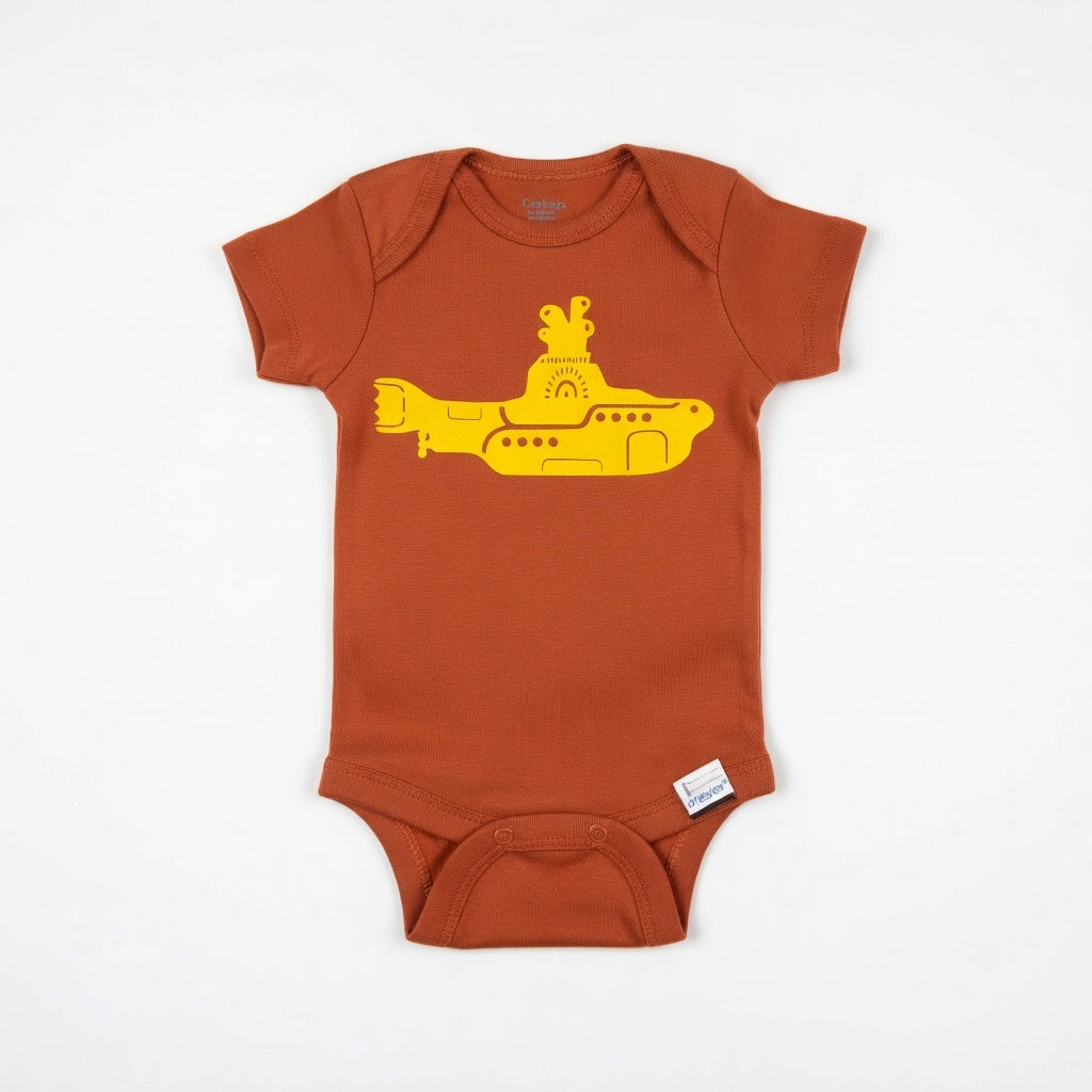 Brown baby onesie with yellow submarine design on a white background
