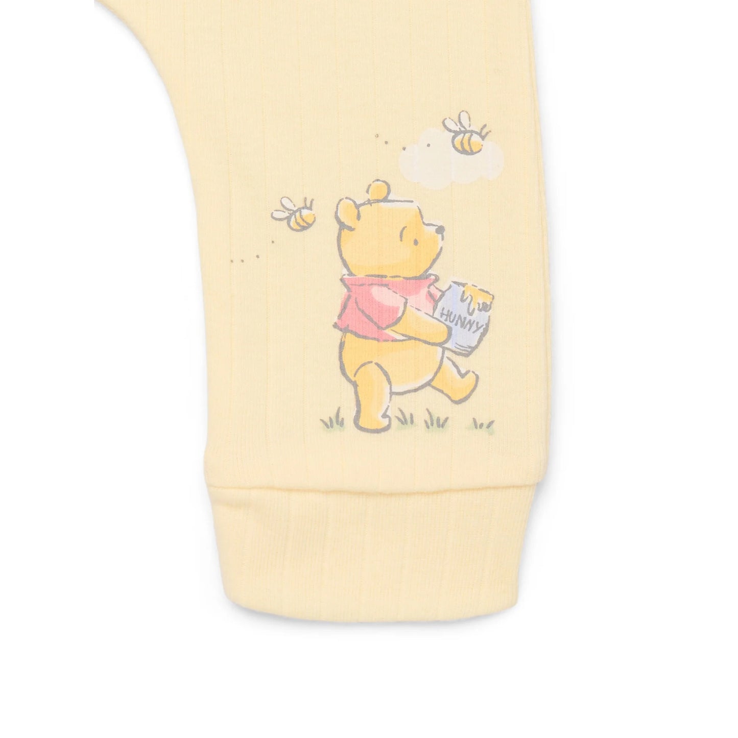 Yellow container with a cartoon bear design on a white background
