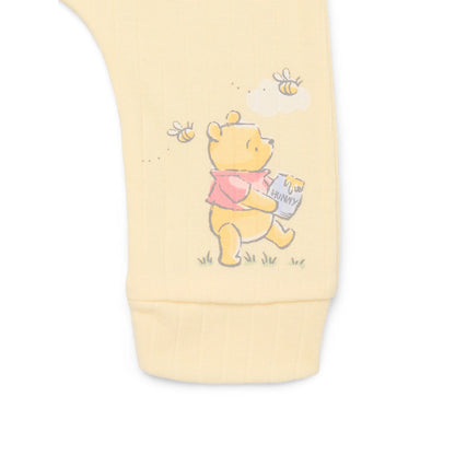Yellow container with a cartoon bear design on a white background