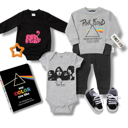 Collection of Pink Floyd-themed children's clothing and items on a white background